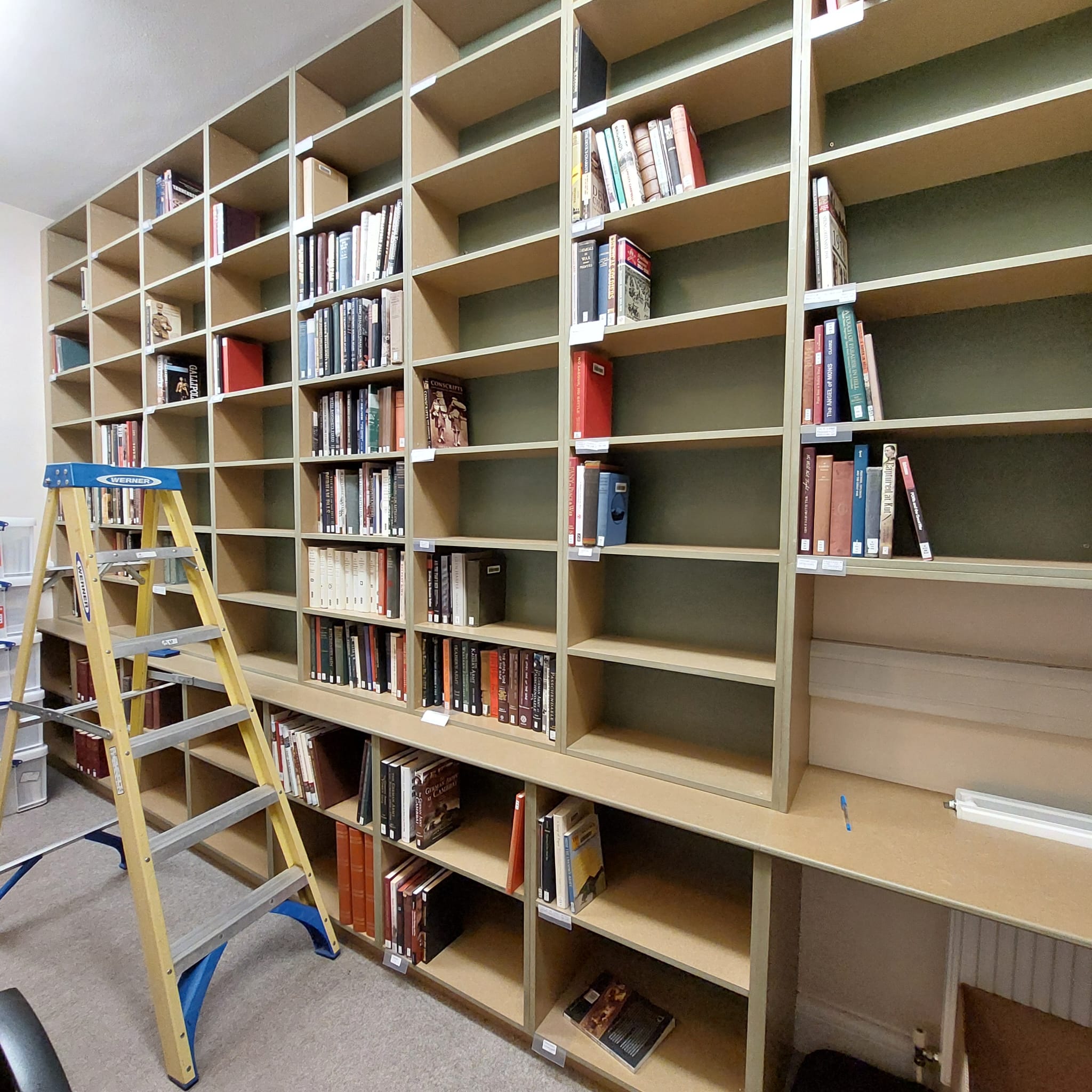 Shelving being installed at Kelso Library